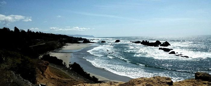 Scenic view of beach against sky