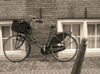 Bicycle parked outside house