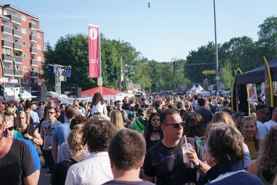 Group of people on street in city