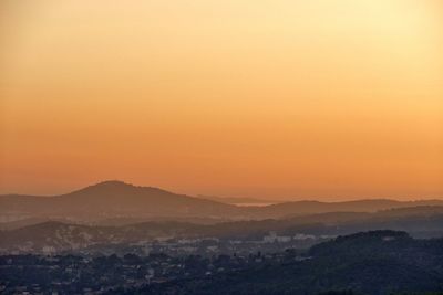 Scenic view of mountains at sunset