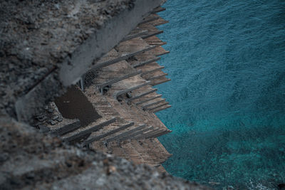 High angle view of concrete on beach