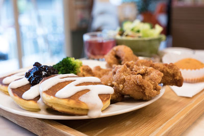 Close-up of served food in plate