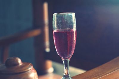 Close-up of wine in glass on table