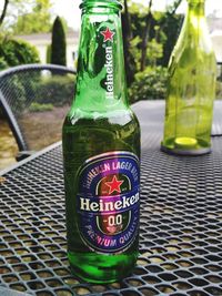 Close-up of glass bottle on table