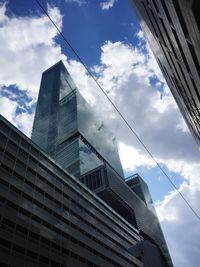 Low angle view of modern buildings against sky