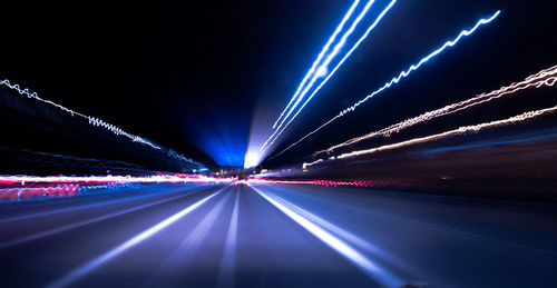 Light trails on road at night