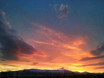 Scenic view of dramatic sky during sunset