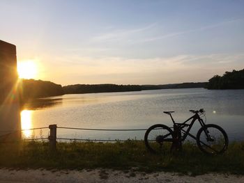 View of river against sky during sunset