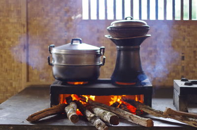 Utensils on wood burning stove