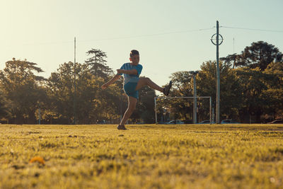 Soccer player kicking the ball