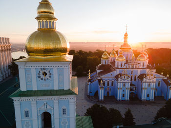 View of cathedral and buildings against sky