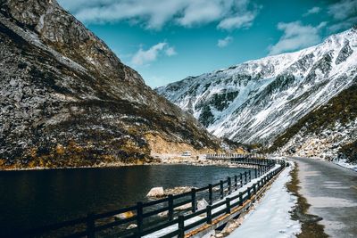 Scenic view of snowcapped mountains against sky