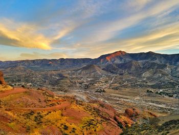 Scenic view of mountains against sky during sunset