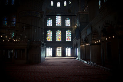 Empty flooring with stained glasses at church