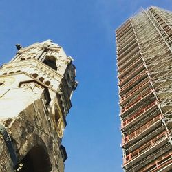 Low angle view of tower against clear blue sky