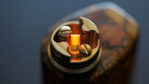 High angle view of lit candles on table