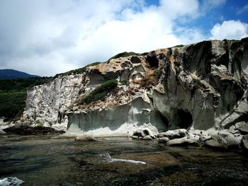 Scenic view of rock formations against sky