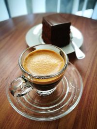 Close-up of coffee cup on table