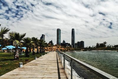 View of city against cloudy sky