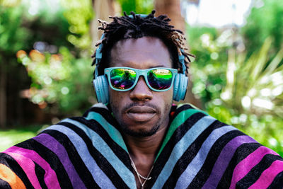 Portrait of young man wearing sunglasses