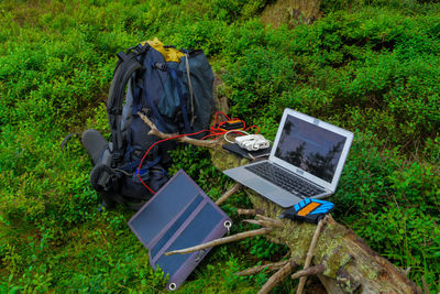 High angle view of laptop on field