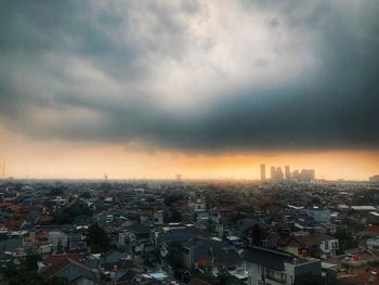 High angle view of townscape against sky during sunset