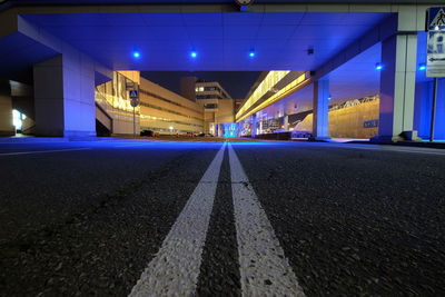 View of illuminated street lights at night