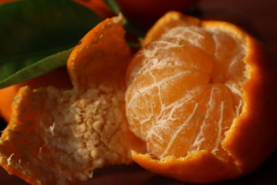 Close-up of orange slice in plate