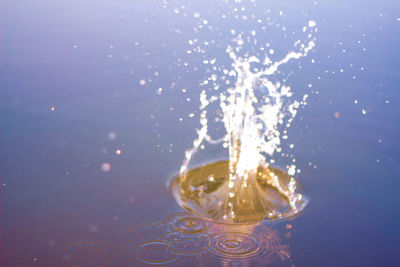 Close-up of splashing water against white background