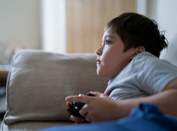 Boy using mobile phone