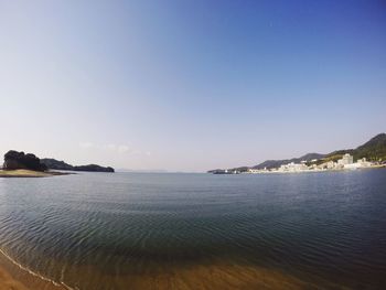 View of calm blue sea against clear sky