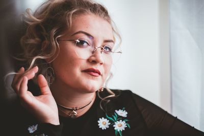 Portrait of beautiful woman with flowers