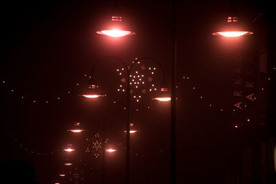 Illuminated street light at night