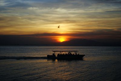 Scenic view of sea at sunset