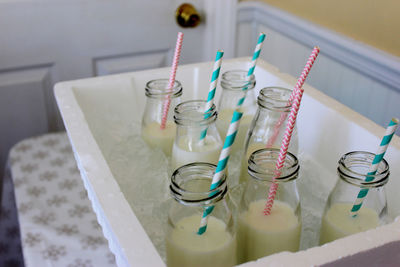 High angle view of bottles on table