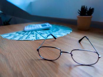 Close-up of eyeglasses on table