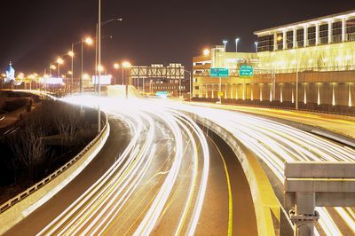 Light trails on city street at night