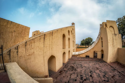 Low angle view of historic building against sky