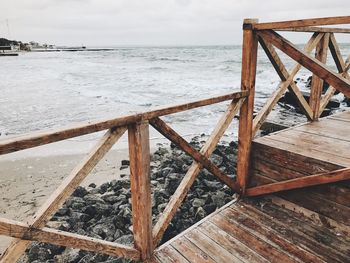 Pier over sea against sky