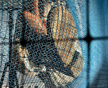 Full frame shot of metal fence in cage