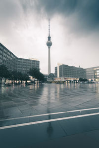 View of buildings in city against sky