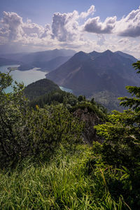 View from mountain jochberg at lake walchensee and mountains herzogstand and heimgarten.