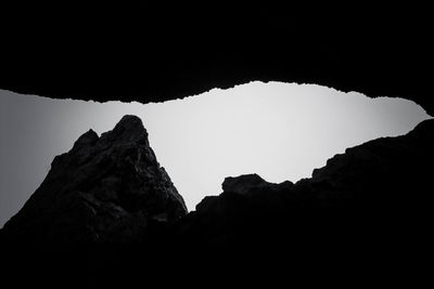 Silhouette of mountains against clear sky