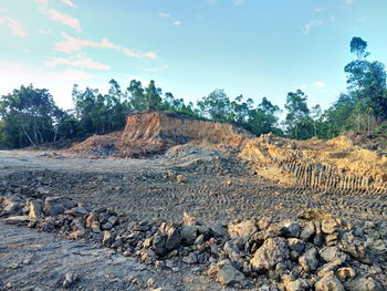 Scenic view of land against sky