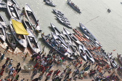 High angle view of people on boat in city