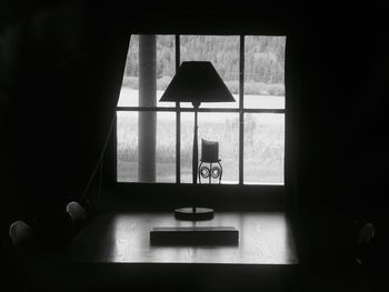 Close-up of window on table at home