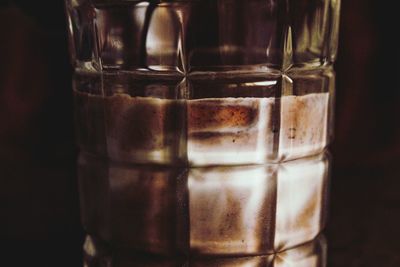 Close-up of drink in glass jar on table