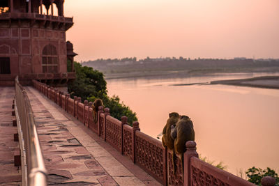 Scenic view of sea against sky at sunset