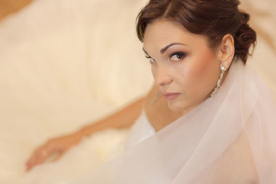 High angle portrait of bride wearing wedding dress