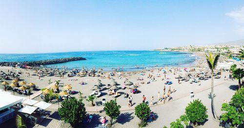 High angle view of people on beach against sky